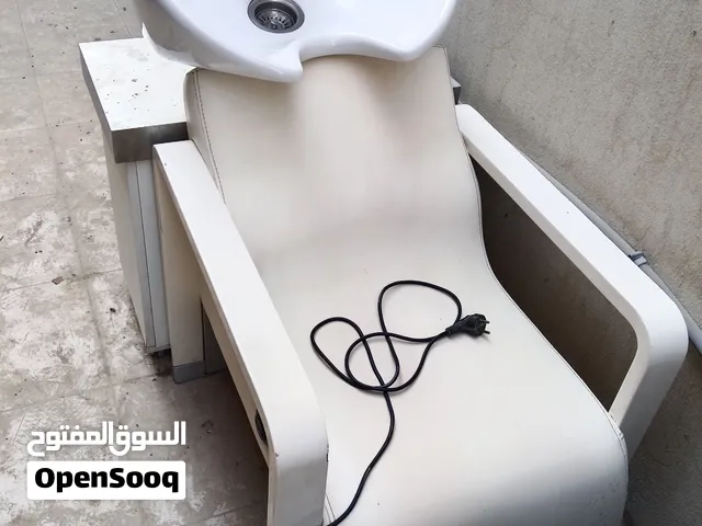 كرسي كهربائي لغسيل الشعر