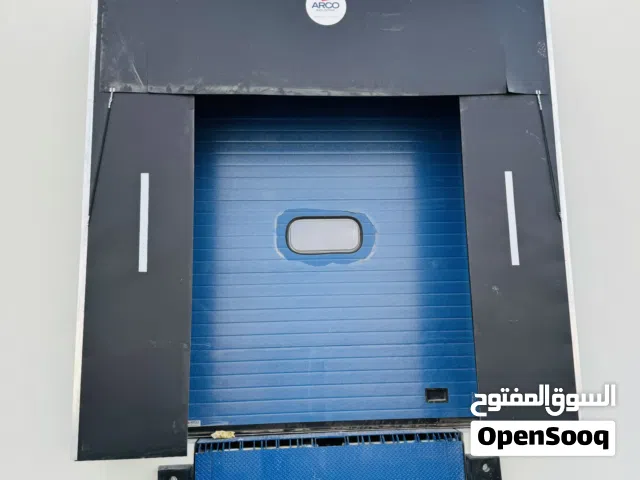 Dock levelers , rapid doors , industrial and residential sectional doors , shelters and cold doors