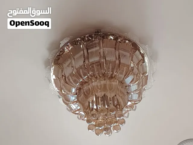 ثريات مع براكيتات جداريه