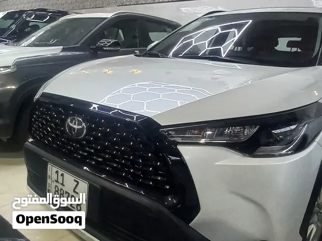 كورولا كروس موديل 2025 عداد المسافة 23,000 السيارة هايبرد الداخل احمر مميز .......