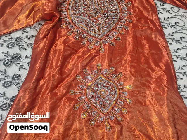 ثوب لون اورنج شغل مناسبة