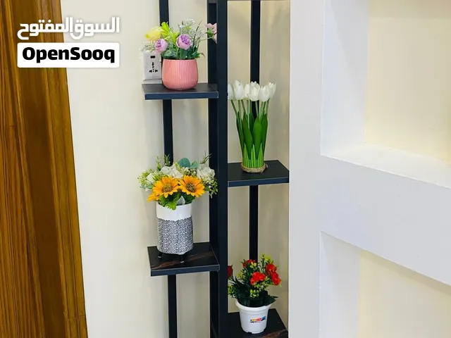 ستاندات مزهريات من الحديد والخشب