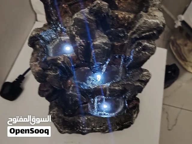 نافوره صغيره شكل خشبي
