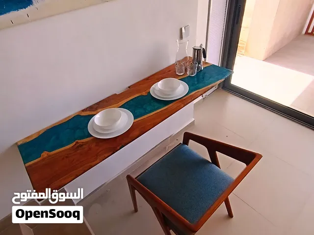Folding table, hand made from Sissoo wood a resin, could be used as a multi purpose table, excellent