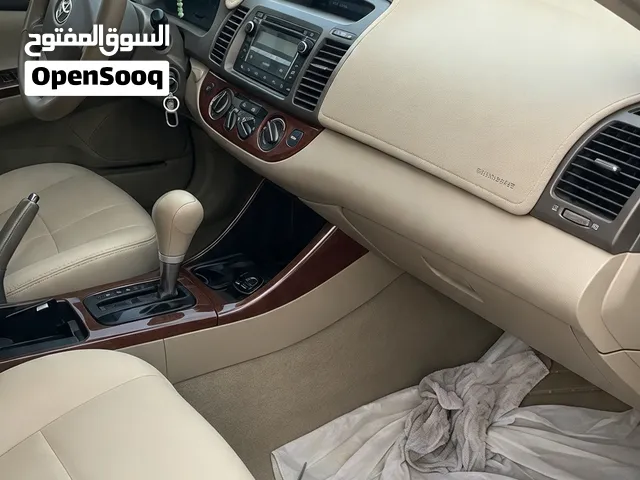 2004 Toyota Camry XLE Electric Sedan with Sunroof and Advanced Features