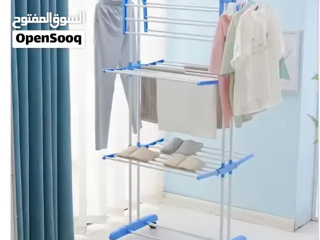 منشر ملابس عامودي ماركة معروف  سهل تتطوي هم بكل مكان تخلي  يتحمل وزن 50 كيلو