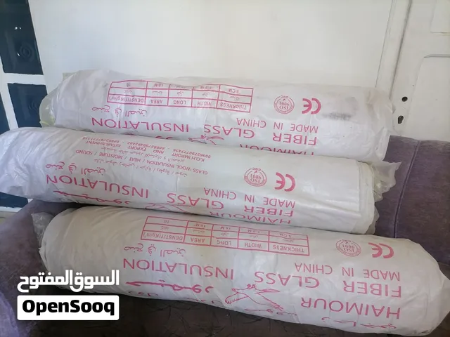 3 رول عازل الصوف الزجاجي لعدم الحاجه سماكة 5 سم طول 15 متر عرض 120 سم يربع 18 متر ضغط 10 كلغ وجهة مق