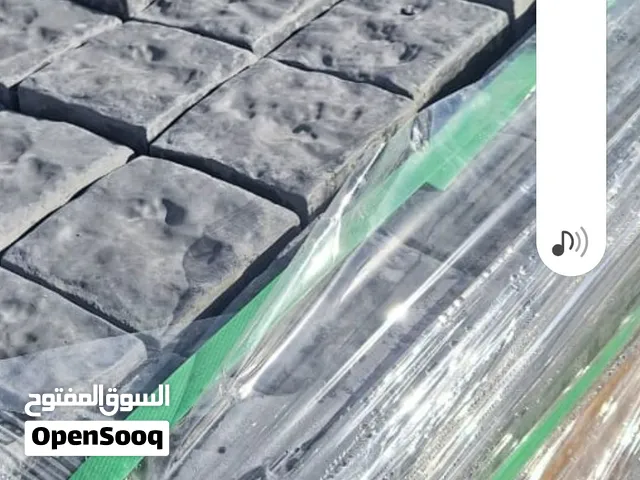 حجر رصيف معشق بازلتي وحجر الي وبلادوره اليه ويدويه بجميع انواعها