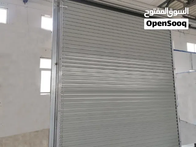 رولينج شتر باب الجراج  الفني الأصلاح Garage Doors Sectional overhead Rolling shutters New Repairing