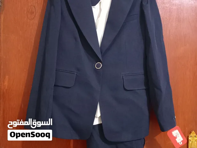 2 new suits very elegant one black and the other navy blue size 42 equivalent to L or XL بدلتين جداد