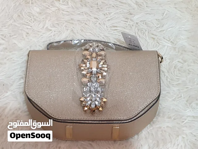 شنطة الدو ذهبي مزهر