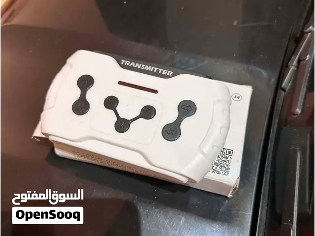 سياره اطفال كهرباء بالريموت وكل حاجتها والكرتونه