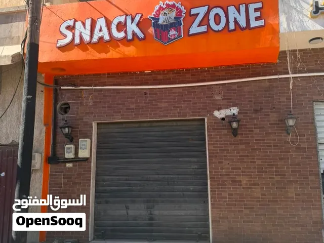 محل للإيجار في سوق الجمعة قرب الشيل المسكر على الطريق الرئيسي