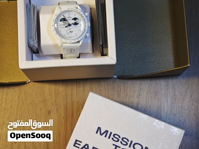 Swatch Omaga Earth phase golden limited edition