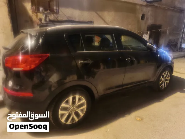 كيه سبورتاج وارد امريكي محرك جي داي موديل 2015 باسمي سنويه ما منتهيه محرك 2400 اللون اسود