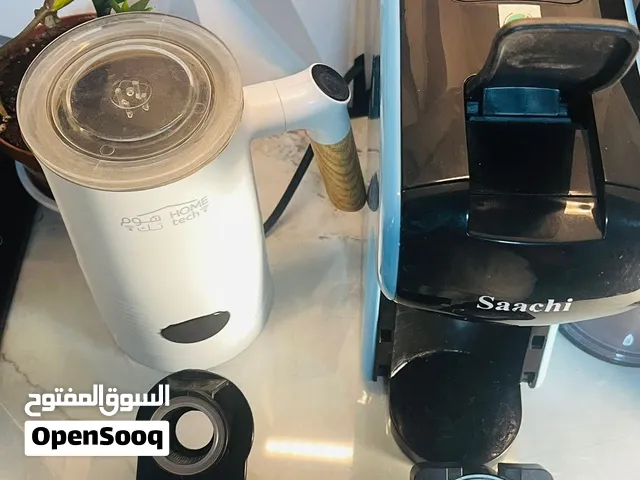 ماكينة قهوة وخفق الحليب