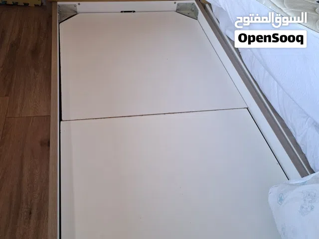 Bedroom: 2 beds, night stand and a wardrobe