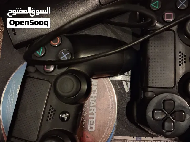 بلايستيشن 4 سليم (PS4 Slim) مع يدين ومجموعة ألعاب