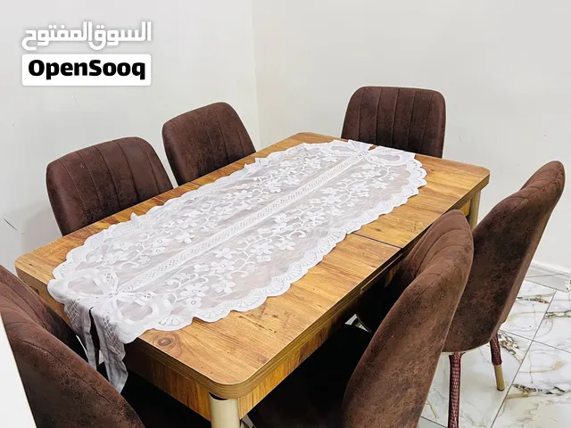 ميز طعام صاج واقدامه حديد