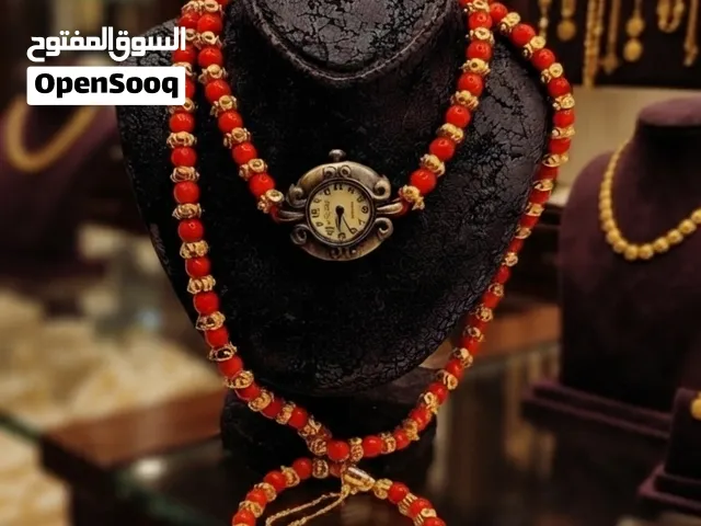 #تخم عمل يدوي قديم من الانتيك الاصلي من المرجان مع فواصل بتغليف ذهب عبارة عن قلادة ( كولييه ) وسوار