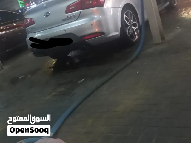 كيا كوب 2014 رمادي محرك 4 سلندر كوبيه مستعملة مع أنوار نهارية وجنوط