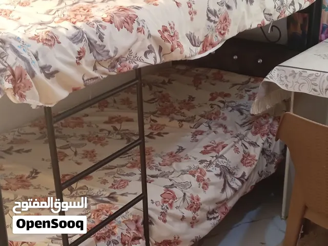 تخت حديد طابقين