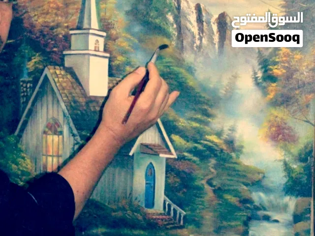 .رسام وفنان يستخدم الألوان الزيتية والرصاص