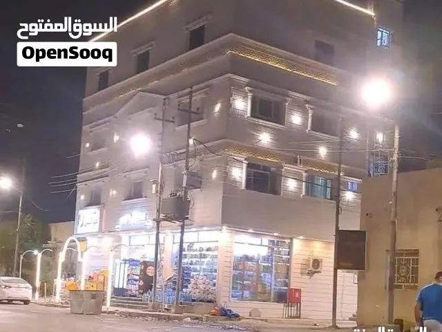 بناية تجارية ركن للبيع في الجنينة على شارع المصلحة