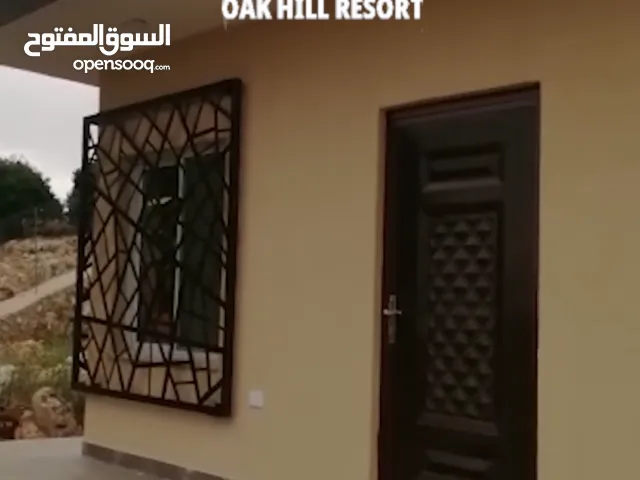 شاليه مع أرض دونم في أجمل غابات عجلون ضمن كومباوند