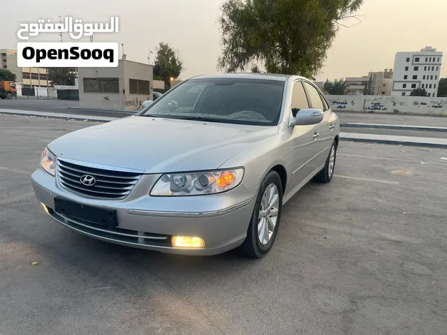 هيونداي ازيرا 2009 كنبيو كبير مسجله ليبيا محرك 27بنزين اصلي ماشيه 153 الف KM عيب مفيش بدن الله كل شي
