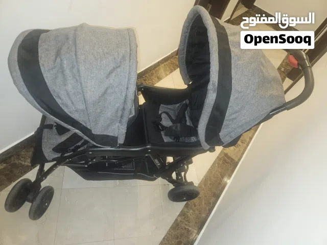 عربة اطفال مقعدين من Juniors للبيع