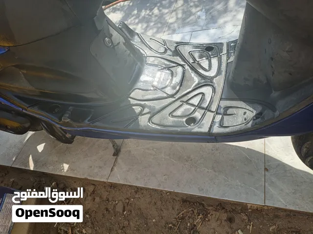 دراجه اكزز باله لون بنفسجي السرعة 100