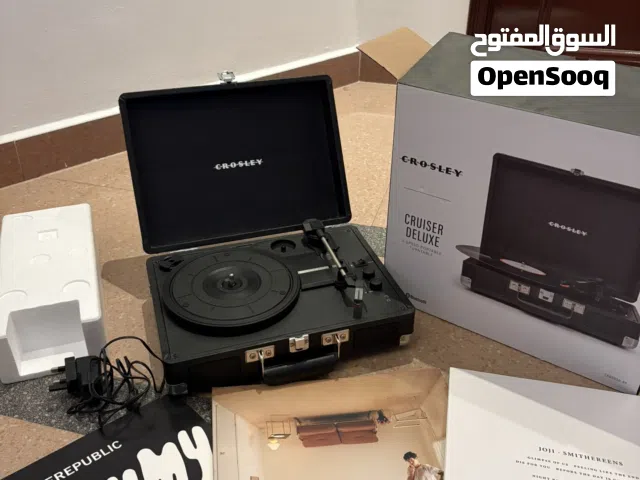 Crosley suitcase-style record player (turntable)