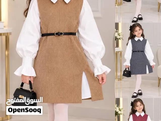 فستان صوف قصير بدون اكمام بفتحه اماميه انيقه