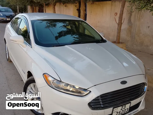 فورد فيوجن هايبر مواصفات امريكيه2جيدخلفي قير وماتور فحص ماشيه 185الف خصوصي اصلي