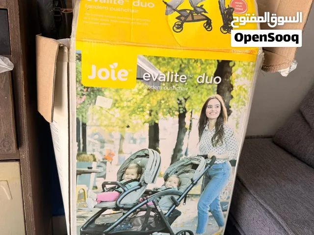 عربة اطفال توأم