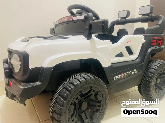 Battery operated electric car for kids with remote control for fun and safety driving experience