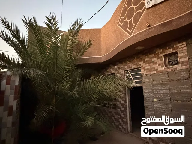 دار طابقين للبيع كربلاء حي الامل عمود 83 يبعد عن الامام الحسين عليه السلام 3كيلو ونص