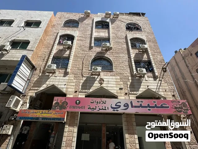 عمارة تجارية للبيع من المالك مباشرة بموقع مميز داخل سوق العقبة — المنطقة التجارية الثانية.