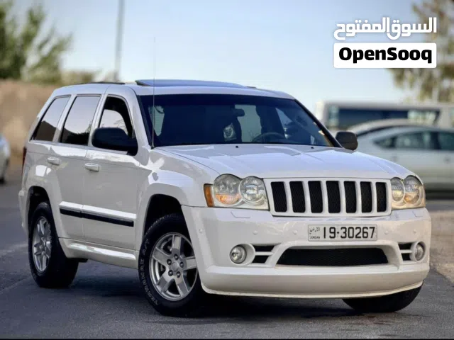 جييب جراند شيروكي (SRT) للاجار يومي /اسبوعي / شهري لون ابيض ، رقم مميز 1-6768
