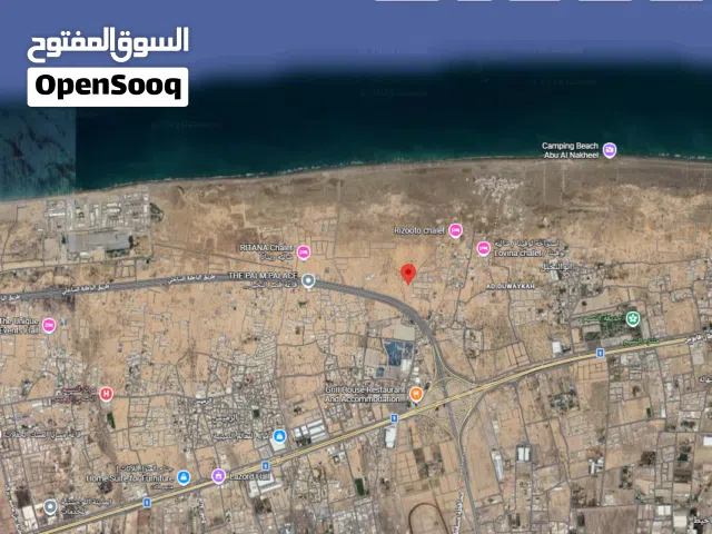 di ارض سكنية في القري الساحل