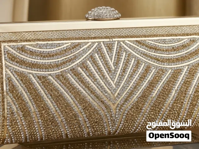 حقيبة سهرة (كلتش) ذهبية للمناسبات والأعراس - شبه جديدة