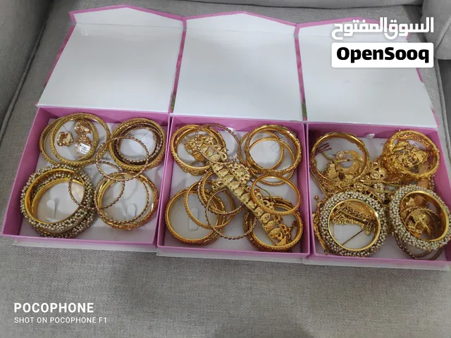 إكسسوارات مطلي ذهب