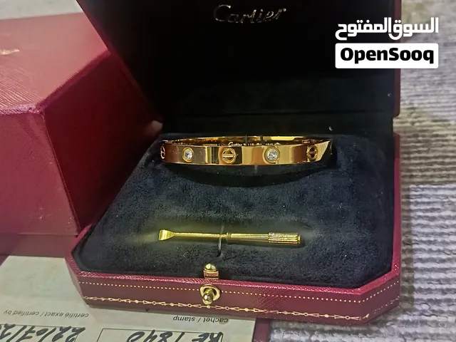سوارة وخاتم وحلق كارتير مطلي ذهب عيار 18 مع كراتينهم وشهاداتهم
