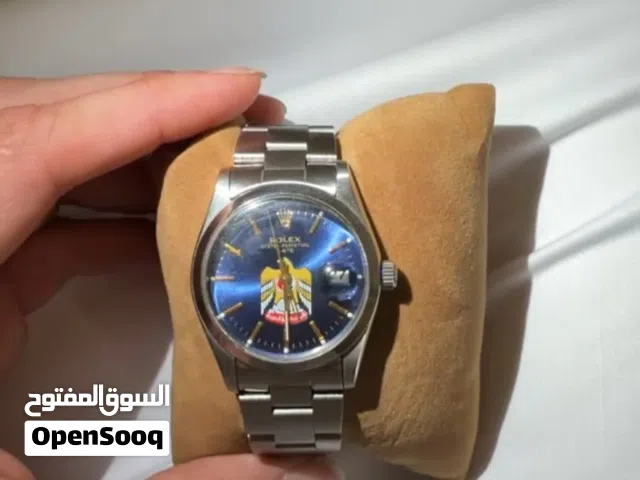روليكس عليها شعار الدولة
