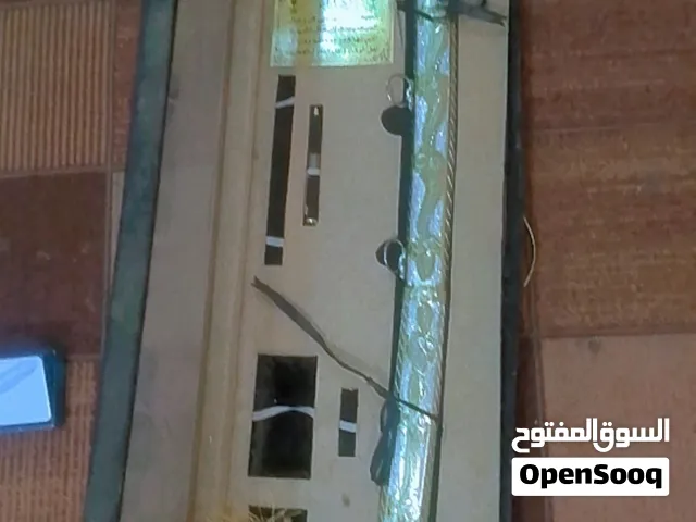 سيف معه قران كريم وقلم وحزامه