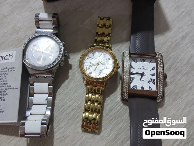 ساعات اصليه كاسيو الذهبيه ريتشي الجلد القهويه وسواتش البيضا