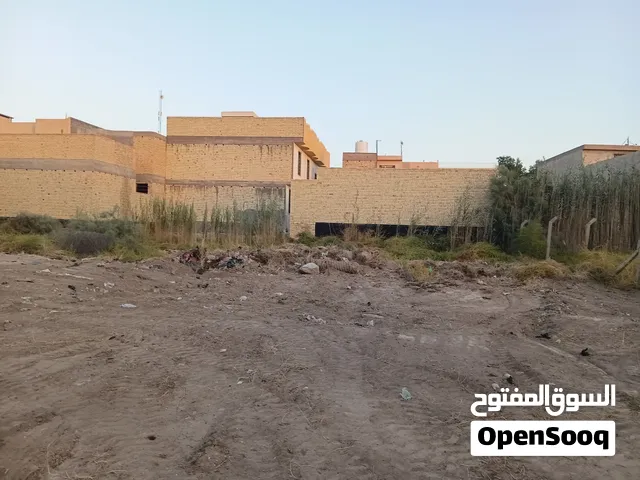 قطعة ارض 100 متر واجهة 7ونص تبعد عن الامام كيلو ونص