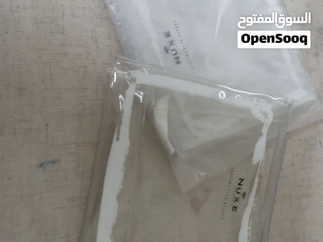Transparent Nuxe Paris Pouch