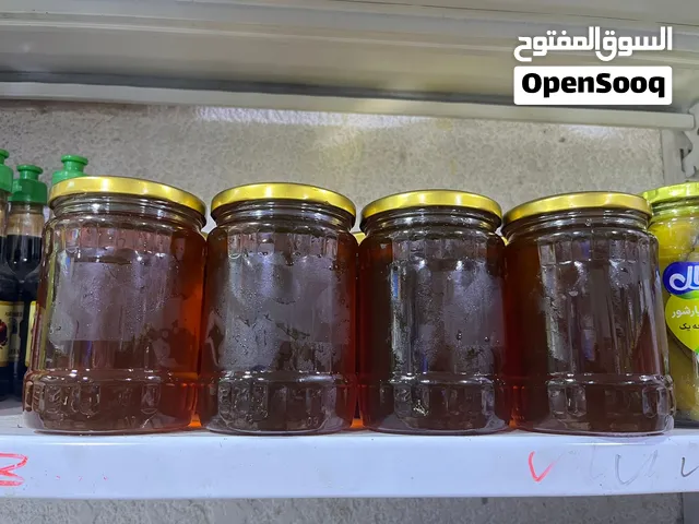 عسل طبيعي اصلي مال دهوك الشيشة نص كيلو تقريبًا سعر الشيشة 15 الف